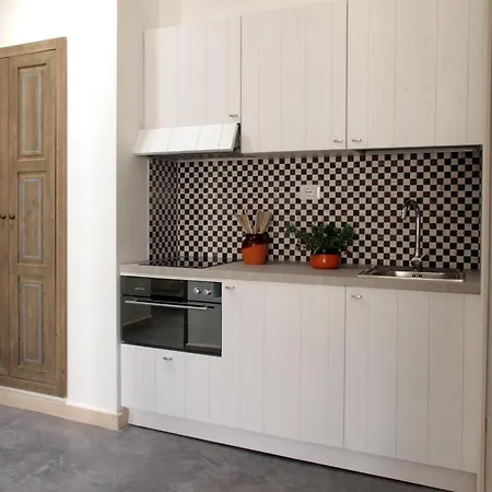 Ξενοδοχείο με διαμερίσματα Borgo De Li Santi